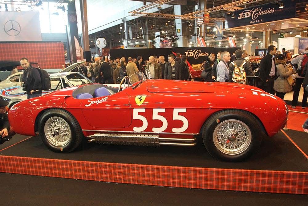 Ferrari number 555 displayed at a classic car show
